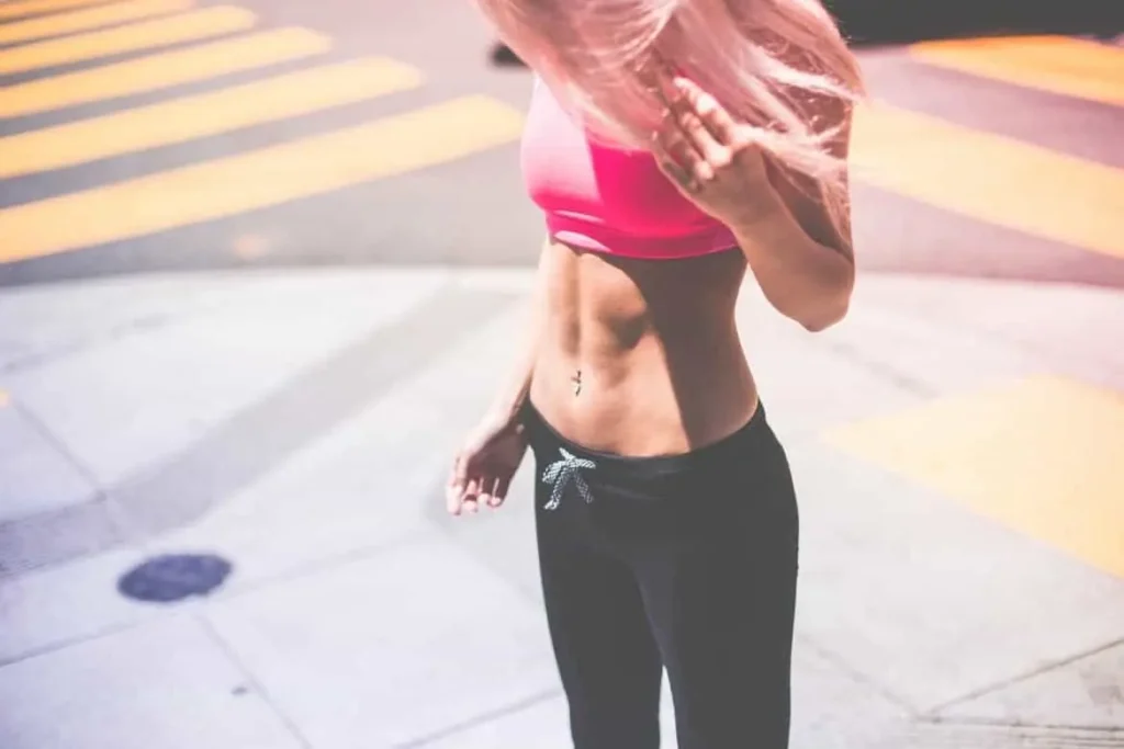 Woman with toned stomach after LA-EMS Body Sculpting Treatment Hampton